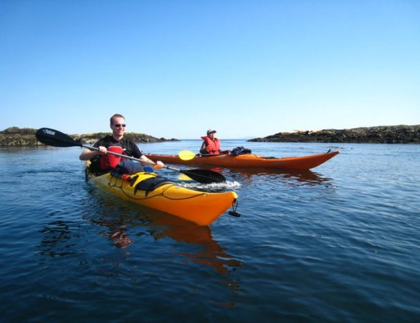 Two kayakers on half day tour